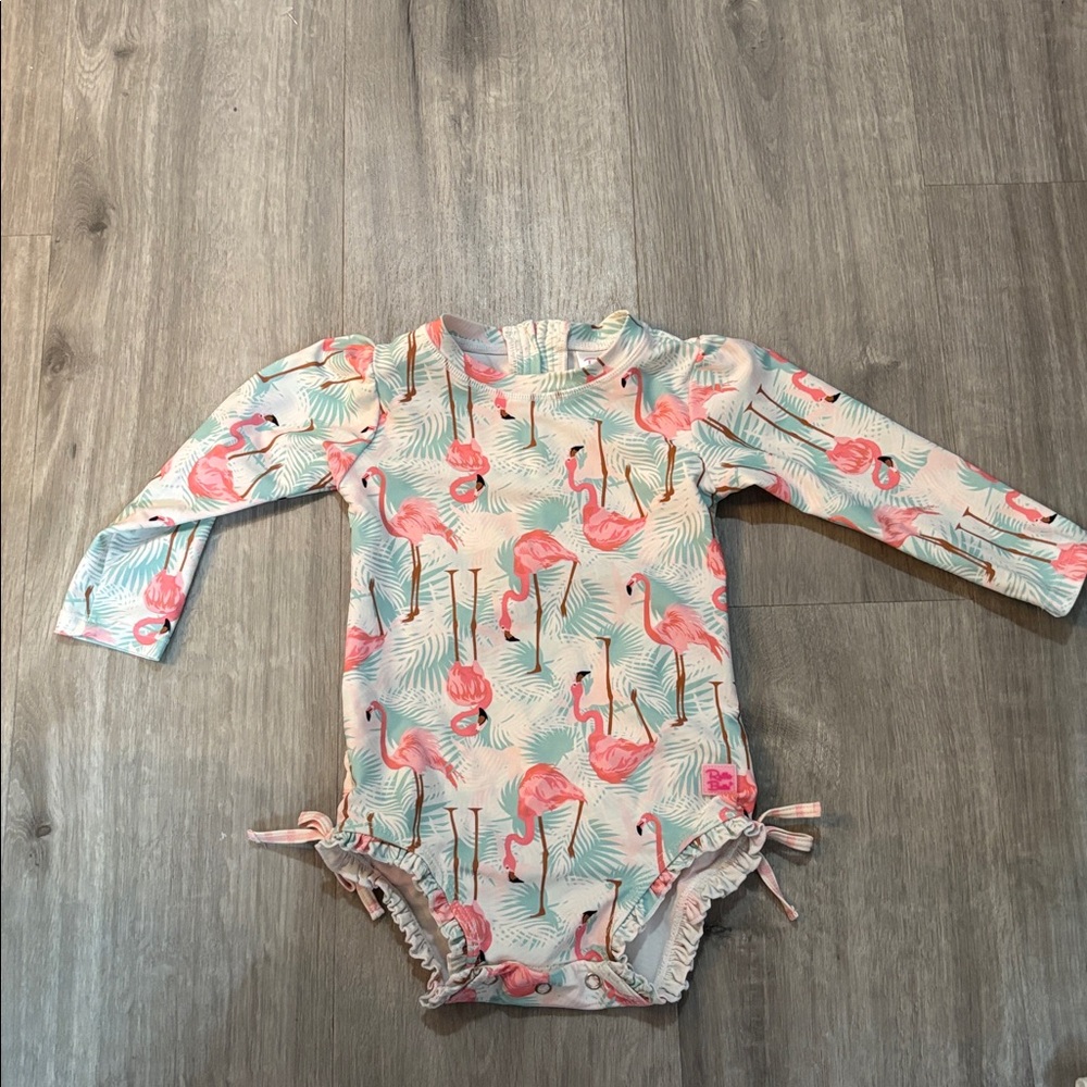 Ruffle Butts Long Sleeve One Piece Rash Guard Swim Suit with flamingos